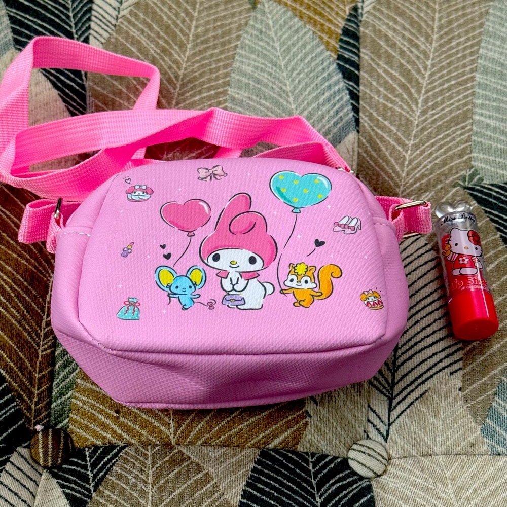 The cutest melody bag comes with a lippie